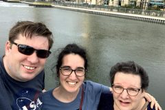Fam selfie in front of the manatee refuge