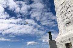 The Wright Brothers' legacy: an airplane towing a banner ad