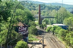 Asheville water tower that read "Stay true" on the way out